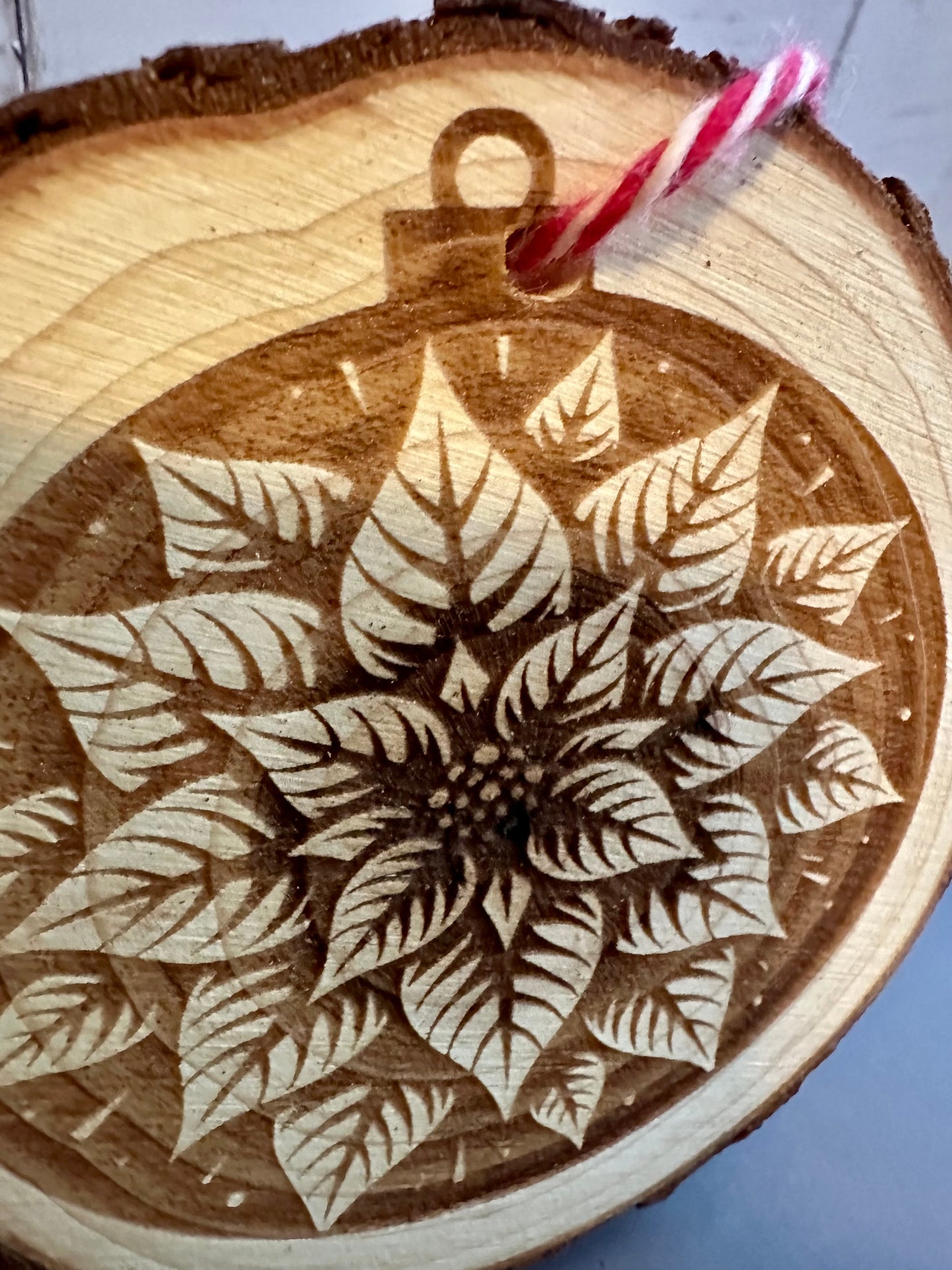 Engraved Live Edge Wooden Round Ornament - Poinsettia Flower