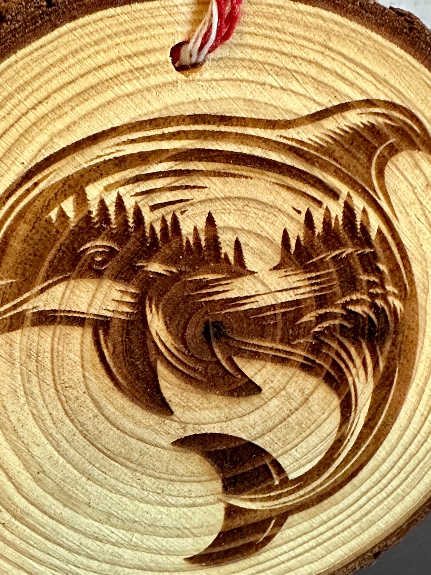 Engraved Live Edge Wooden Round Ornament - Dolphin with Inner Wilderness Scene