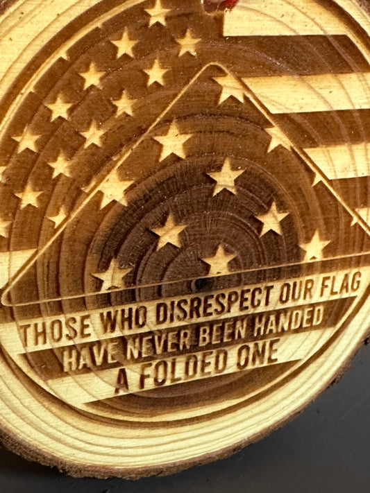 Engraved Live Edge Wooden Round Ornament - Folded Flag