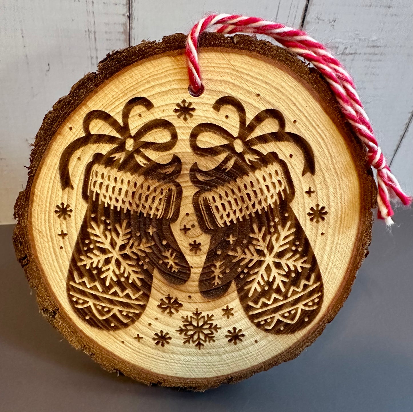 Engraved Live Edge Wooden Round Ornament - Ornate Christmas Mittens