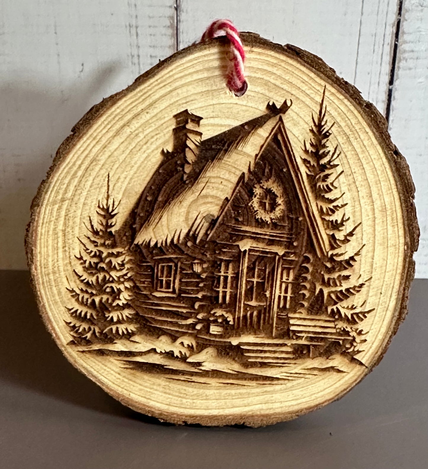 Engraved Live Edge Wooden Round Ornament - Winter Wilderness Cabin