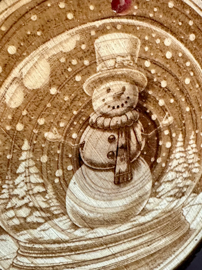 Engraved Live Edge Wooden Round Ornament - Snowman in Snowglobe