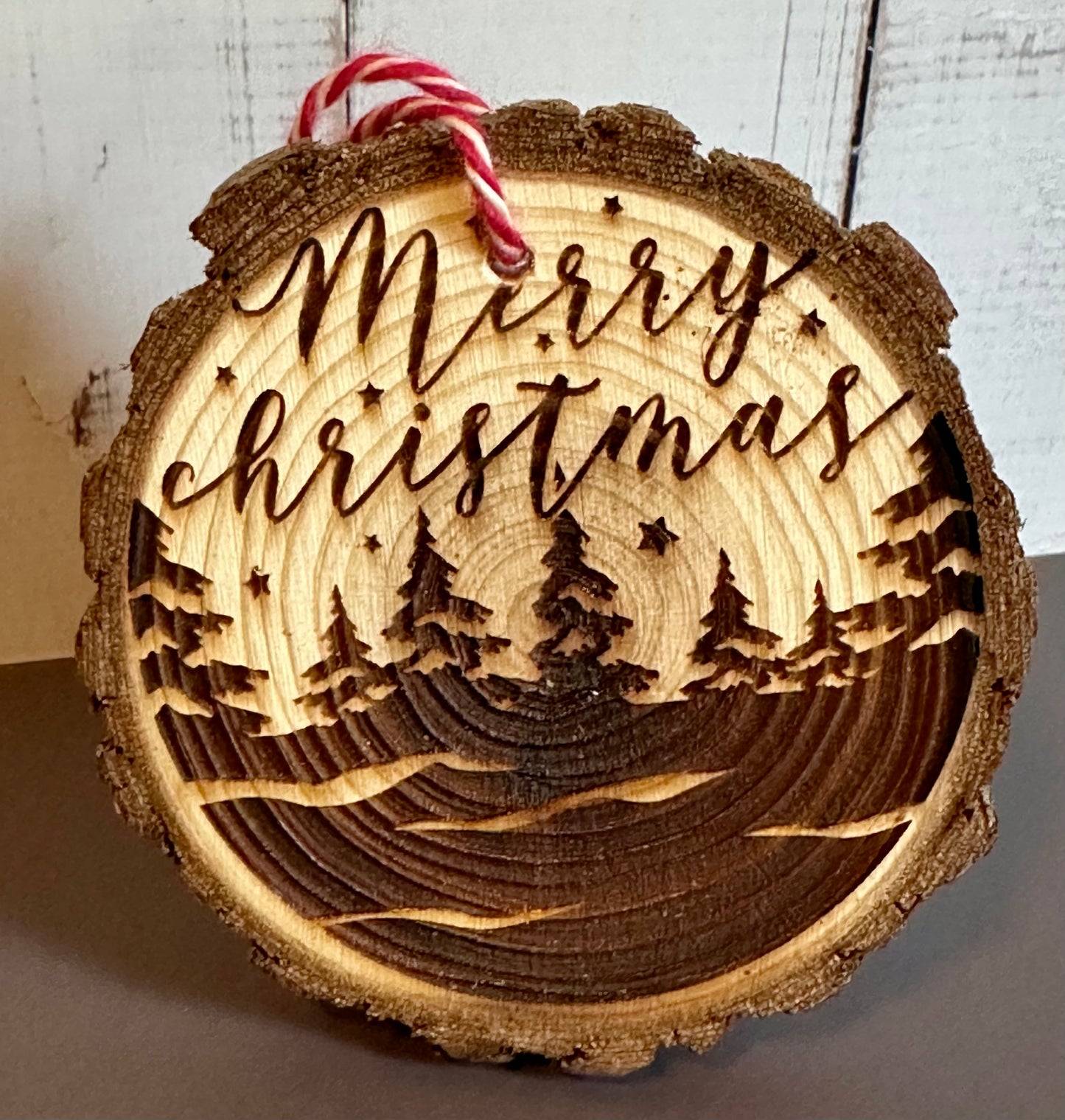 Engraved Live Edge Wooden Round Ornament - Treelined Merry Christmas