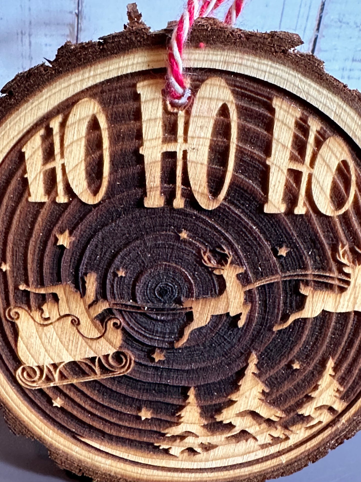 Engraved Live Edge Wooden Round Ornament - Ho Ho Ho, Santa’s Sleigh and Reindeer