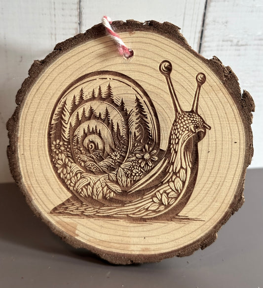 Engraved Live Edge Wooden Round Ornament - Snail with Inner Wilderness Scene
