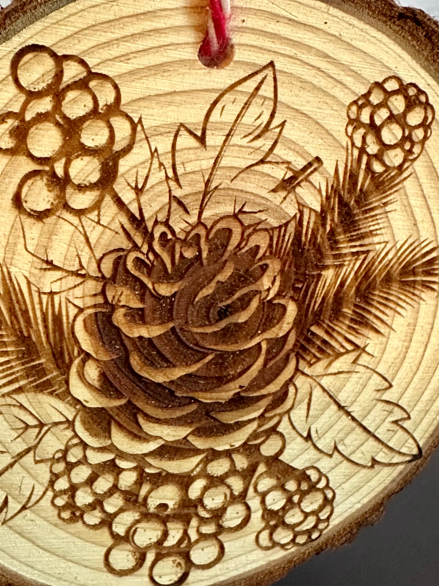Engraved Live Edge Wooden Round Ornament - Pinecone with Berries