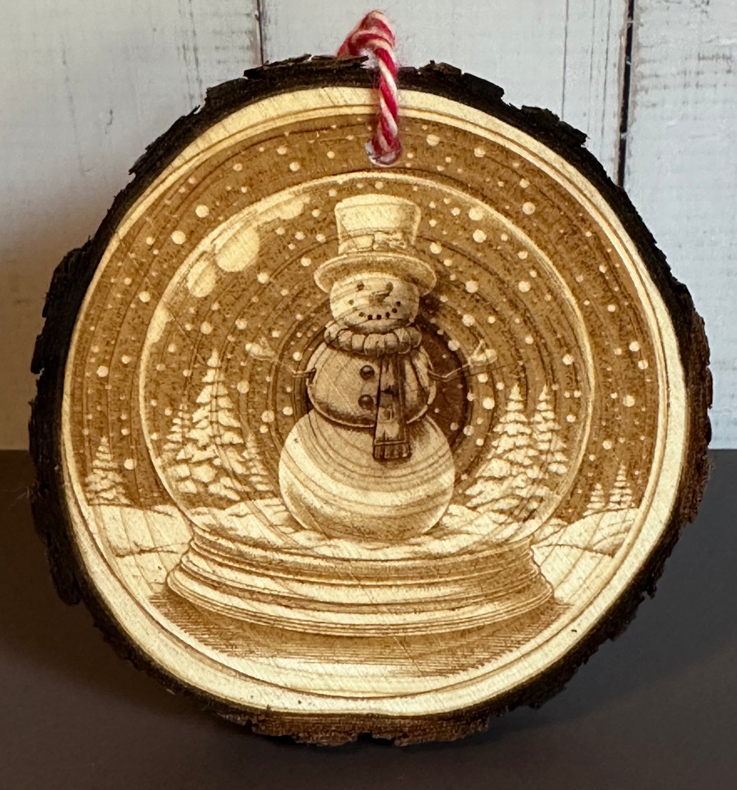 Engraved Live Edge Wooden Round Ornament - Snowman in Snowglobe
