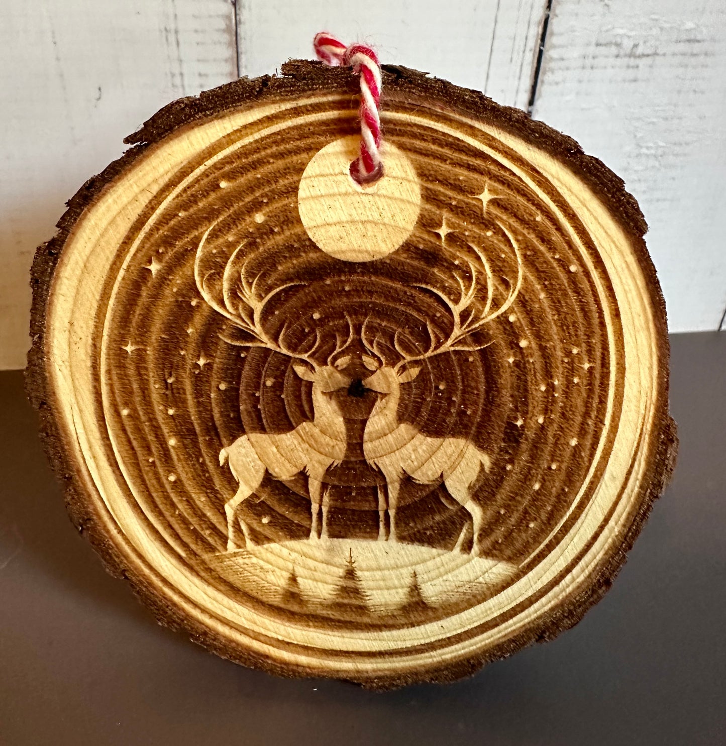Engraved Live Edge Wooden Round Ornament - Two Reindeer in the Moonlight