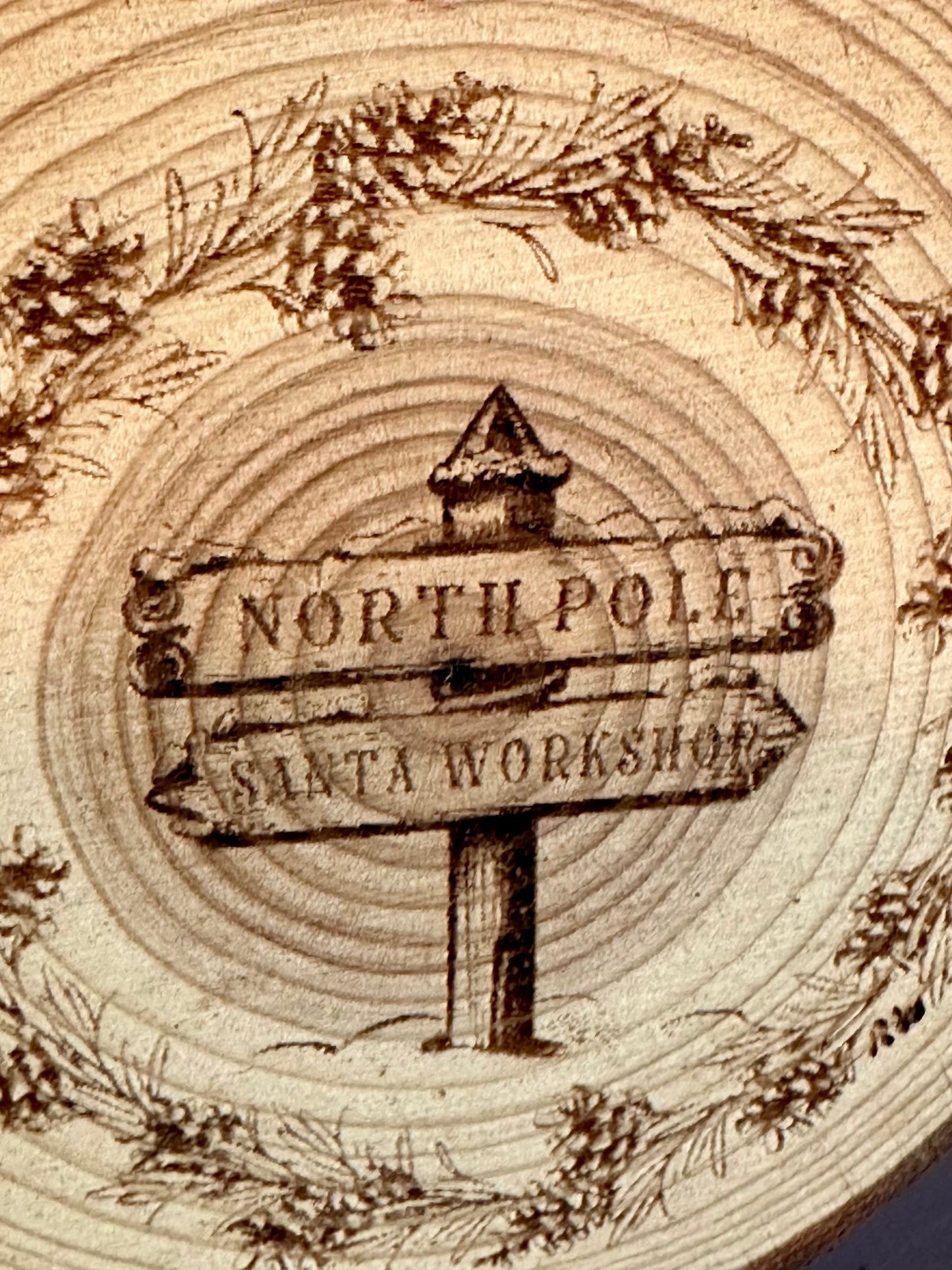 Engraved Live Edge Wooden Round Ornament - North Pole & Santa’s Workshop Sign