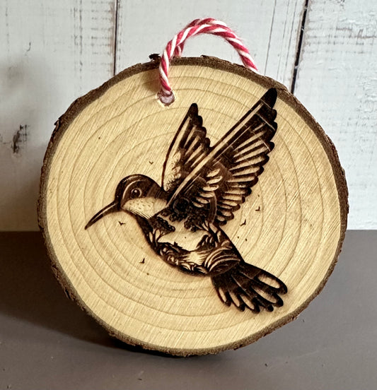 Engraved Live Edge Wooden Round Ornament - Hummingbird with Inner Wilderness Scene