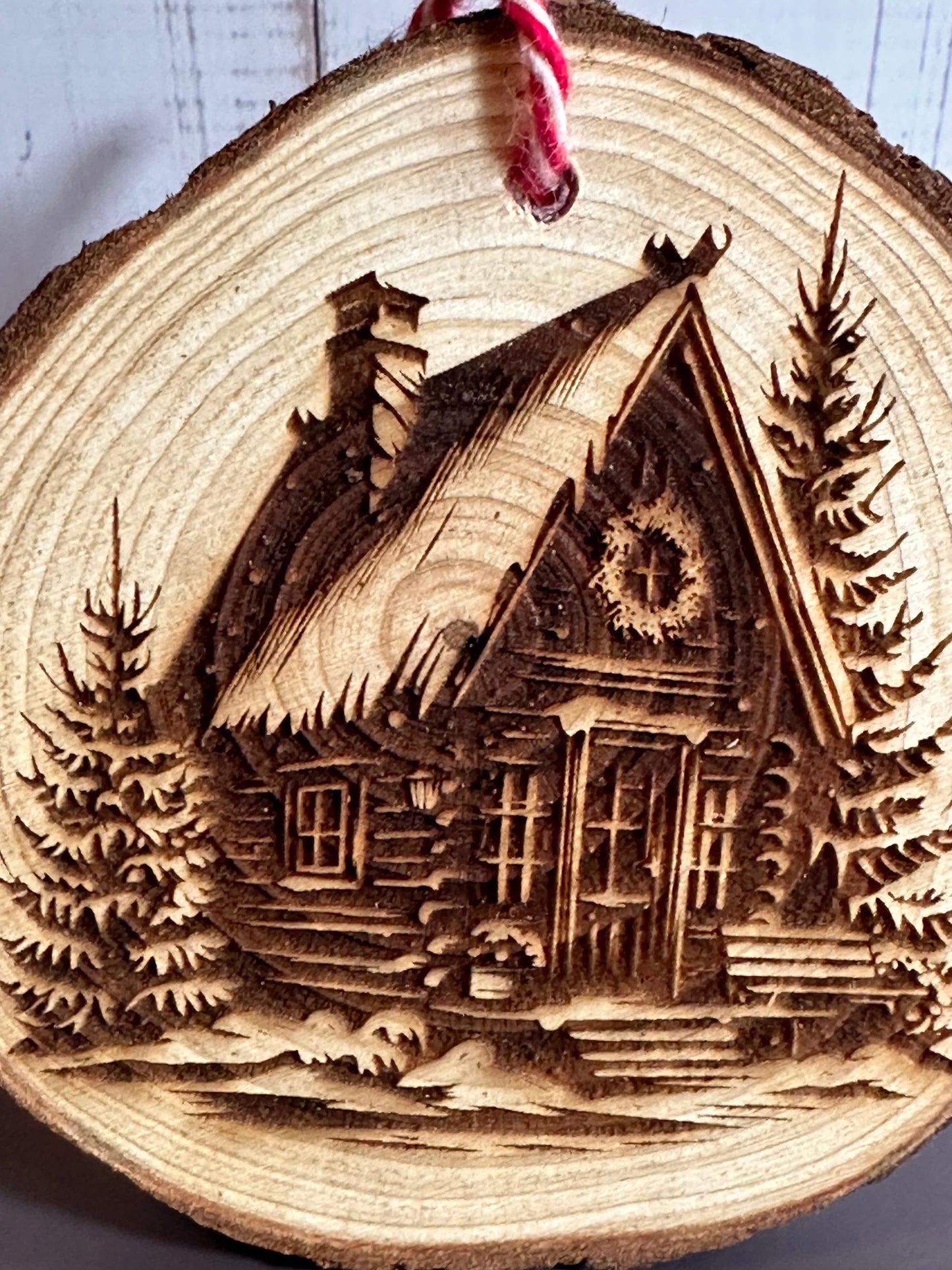 Engraved Live Edge Wooden Round Ornament - Winter Wilderness Cabin