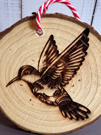 Engraved Live Edge Wooden Round Ornament - Hummingbird with Inner Wilderness Scene