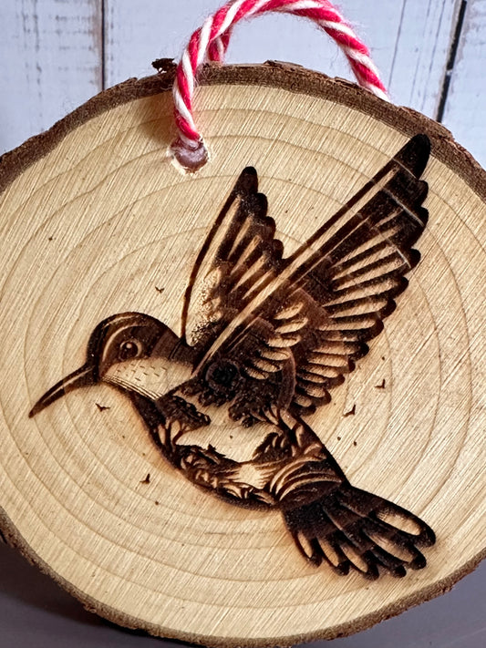 Engraved Live Edge Wooden Round Ornament - Hummingbird with Inner Wilderness Scene