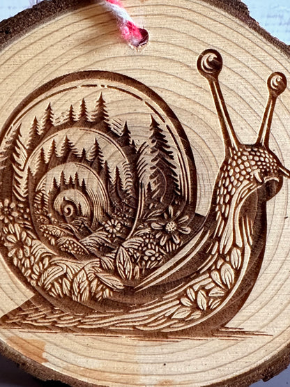 Engraved Live Edge Wooden Round Ornament - Snail with Inner Wilderness Scene