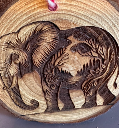 Engraved Live Edge Wooden Round Ornament - Elephant with Inner Wilderness Scene